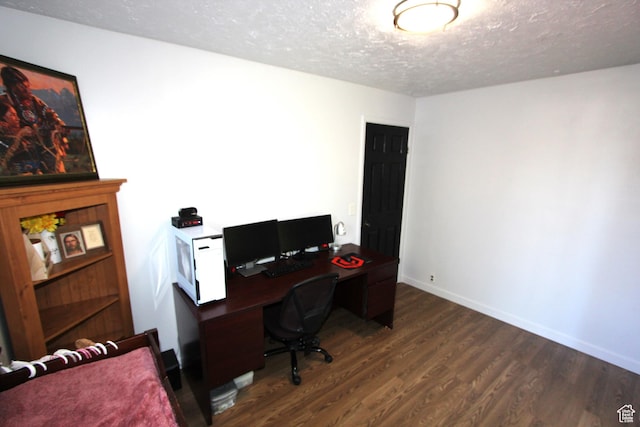 324 W 600 N, Logan, UT 84321 - office with dark wood finished floors, a textured ceiling, and baseboards