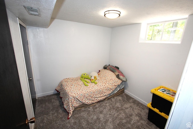 324 W 600 N, Logan, UT 84321 - carpeted bedroom featuring baseboards and a textured ceiling