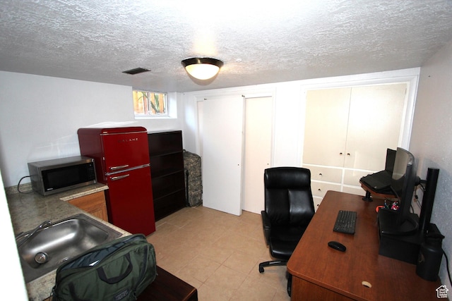 324 W 600 N, Logan, UT 84321 - home office featuring a textured ceiling and light tile patterned floors
