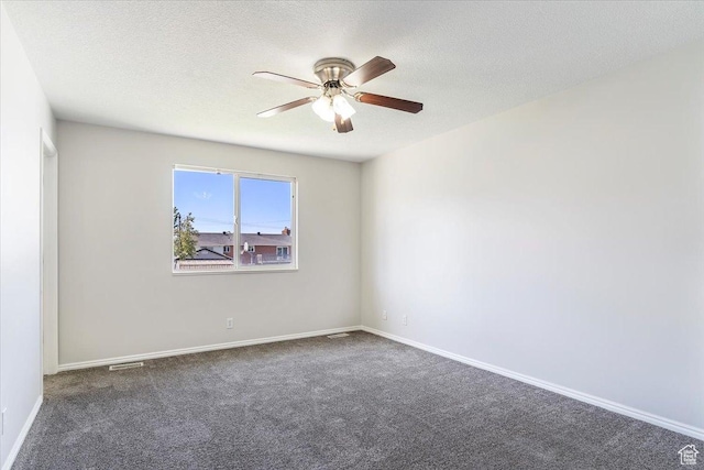 1627 W 350 N, West Point, UT 84015 - empty room with dark carpet, ceiling fan, baseboards, and a textured ceiling