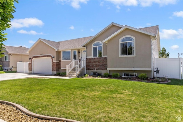 1627 W 350 N, West Point, UT 84015 - ranch-style home featuring concrete driveway, an attached garage, and brick siding
