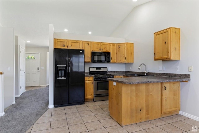 1627 W 350 N, West Point, UT 84015 - kitchen with black appliances, a peninsula, dark countertops, a sink, and baseboards