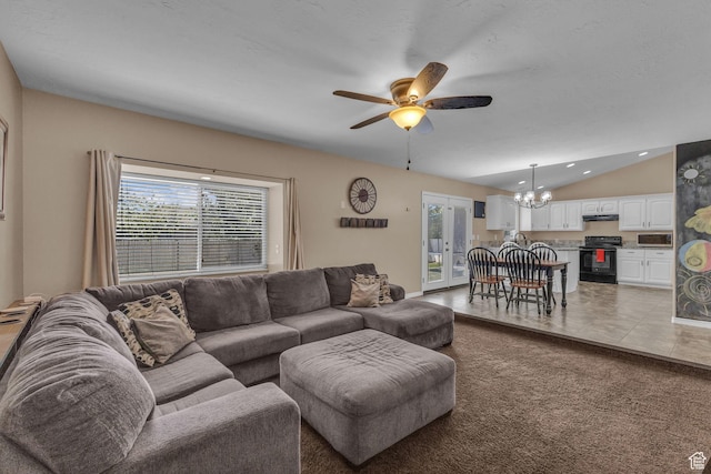 1123 N 3050 W, West Point, UT 84015 - living room featuring a chandelier, plenty of natural light, ceiling fan, vaulted ceiling, and light carpet