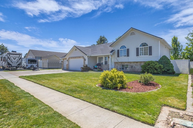 1123 N 3050 W, West Point, UT 84015 - tri-level home with driveway and an attached garage