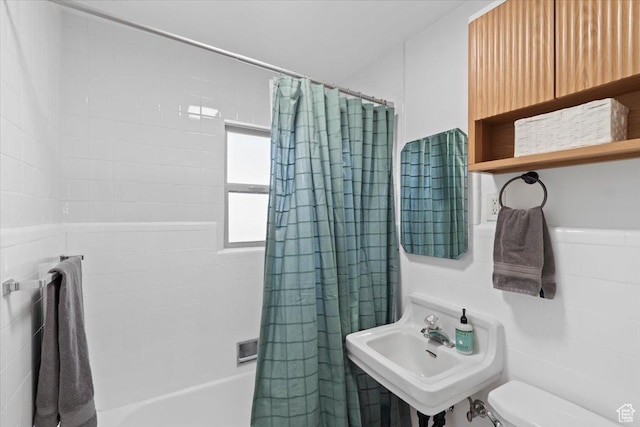 35 E Redondo Ave, Salt Lake City, UT 84115 - bathroom with shower / tub combo, toilet, a sink, and tile walls