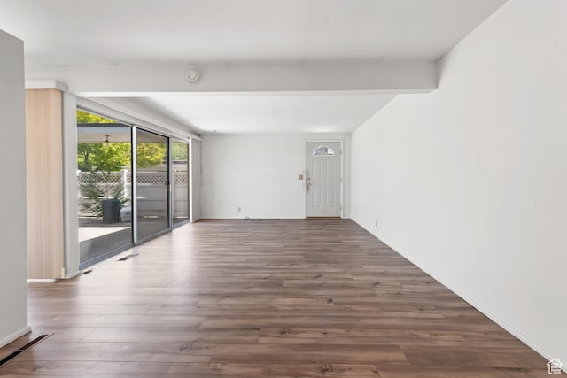3616 S 860 E Unit 72, Salt Lake City, UT 84106 - empty room with wood finished floors, beamed ceiling, baseboards, and a smoke detector