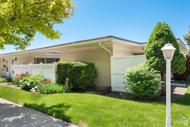 3616 S 860 E Unit 72, Salt Lake City, UT 84106 - view of home's exterior featuring brick siding