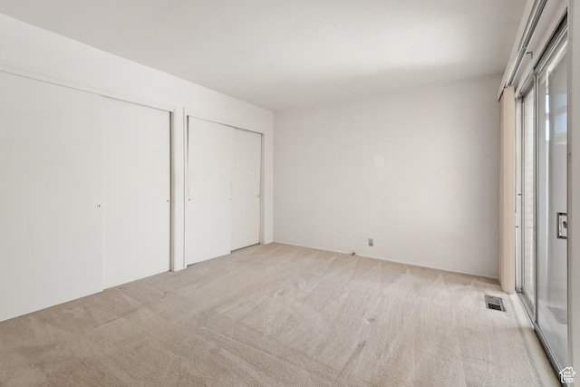 3616 S 860 E Unit 72, Salt Lake City, UT 84106 - unfurnished bedroom with two closets and carpet