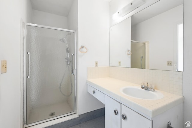 3616 S 860 E Unit 72, Salt Lake City, UT 84106 - bathroom with tasteful backsplash, vanity, and a shower stall