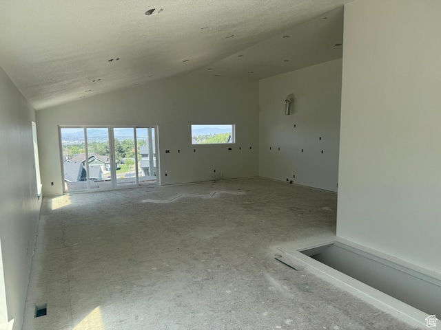 3023 N Mountain Rd E Unit 212, North Ogden, UT 84414 - unfurnished room with lofted ceiling