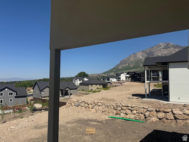 3023 N Mountain Rd E Unit 212, North Ogden, UT 84414 - view of yard featuring a residential view and a mountain view