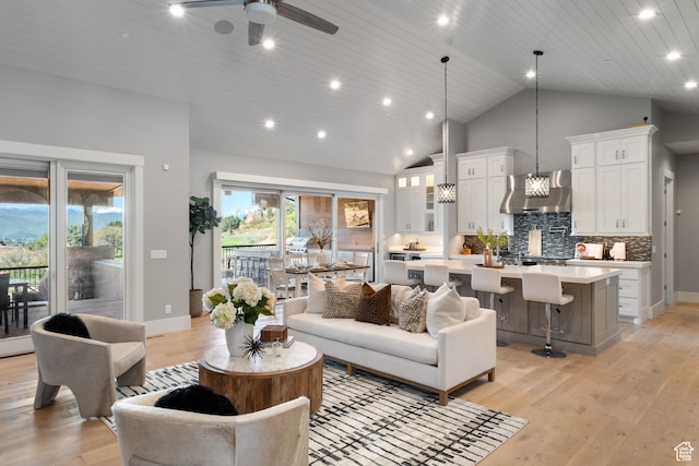 523 N Red Ct, Heber City, UT 84032 - living room with light wood-type flooring, a ceiling fan, recessed lighting, a chandelier, and baseboards