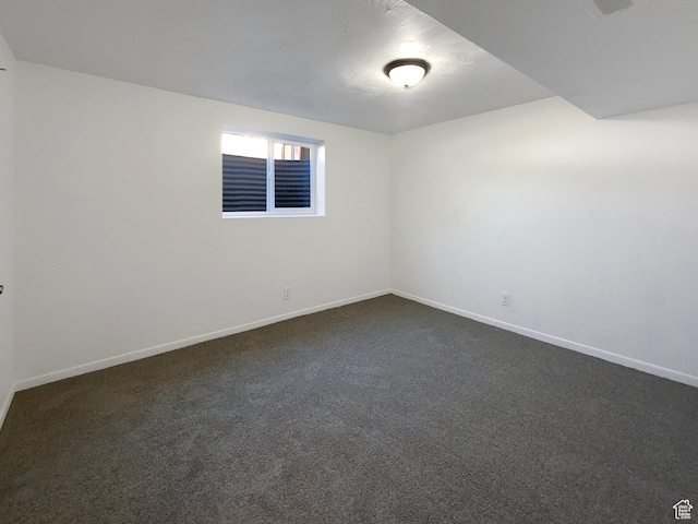 5644 S Treebeard Rd, Taylorsville, UT 84129 - spare room featuring baseboards and dark carpet