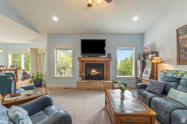 2078 E 3025 N, North Logan, UT 84341 - carpeted living room featuring vaulted ceiling, a lit fireplace, baseboards, a ceiling fan, and recessed lighting