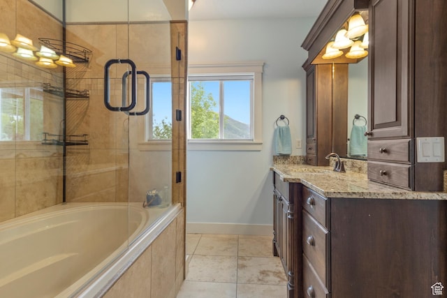 2078 E 3025 N, North Logan, UT 84341 - bathroom with a relaxing tiled tub, baseboards, vanity, tiled shower, and tile patterned floors
