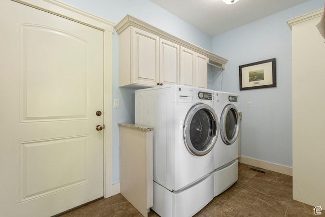2078 E 3025 N, North Logan, UT 84341 - laundry area with washer and dryer, cabinet space, and baseboards