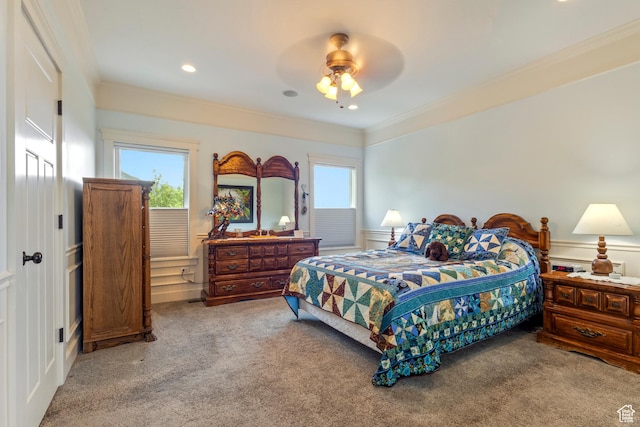 2078 E 3025 N, North Logan, UT 84341 - carpeted bedroom with a decorative wall, crown molding, a wainscoted wall, and a ceiling fan
