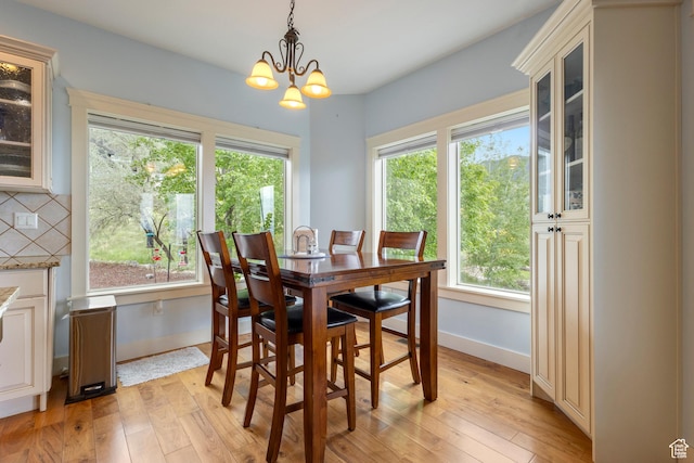 2078 E 3025 N, North Logan, UT 84341 - dining room with light wood-style flooring, plenty of natural light, and baseboards