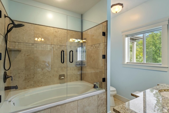 2078 E 3025 N, North Logan, UT 84341 - bathroom featuring vanity, toilet, tiled shower / bath, tile patterned floors, and baseboards