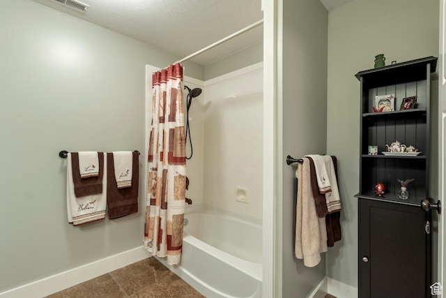 2078 E 3025 N, North Logan, UT 84341 - bathroom with baseboards and shower / bath combo with shower curtain