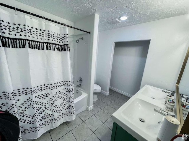 1303 N 150 E, Nephi, UT 84648 - bathroom with tile patterned floors, a textured ceiling, shower / bath combination with curtain, toilet, and double vanity