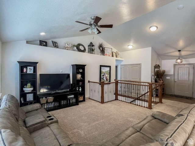 1303 N 150 E, Nephi, UT 84648 - carpeted living room featuring vaulted ceiling, ceiling fan, and a textured ceiling