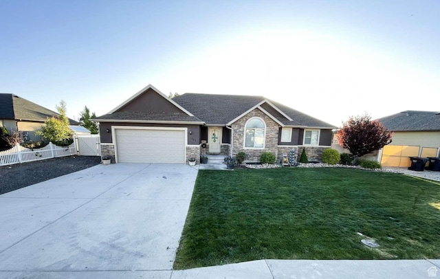 1303 N 150 E, Nephi, UT 84648 - ranch-style house featuring a garage, stone siding, concrete driveway, a gate, and stucco siding