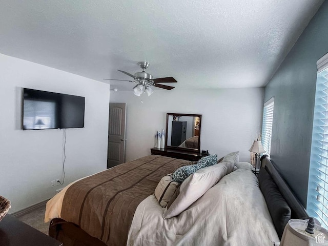 1303 N 150 E, Nephi, UT 84648 - carpeted bedroom featuring a ceiling fan and a textured ceiling