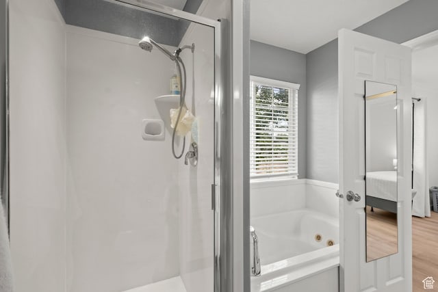 524 N 2870 W, Provo, UT 84601 - ensuite bathroom with a shower stall, a whirlpool tub, and wood finished floors