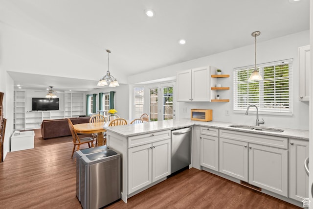 524 N 2870 W, Provo, UT 84601 - kitchen featuring a sink, dishwasher, dark wood-type flooring, a peninsula, and vaulted ceiling