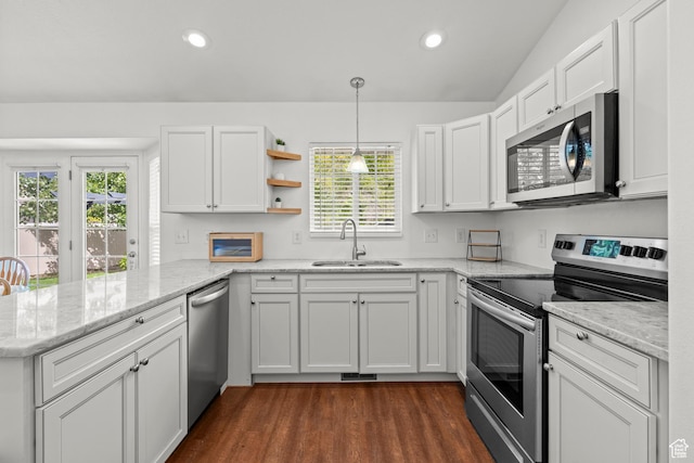 524 N 2870 W, Provo, UT 84601 - kitchen with stainless steel appliances, a sink, a peninsula, healthy amount of natural light, and recessed lighting