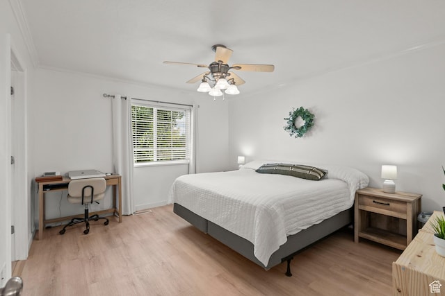 524 N 2870 W, Provo, UT 84601 - bedroom with light wood-type flooring, an office area, ornamental molding, and a ceiling fan