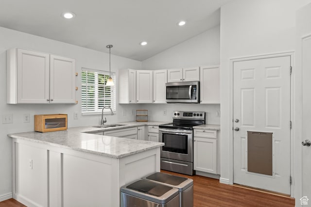 524 N 2870 W, Provo, UT 84601 - kitchen featuring stainless steel appliances, a sink, a peninsula, white cabinetry, and dark wood finished floors
