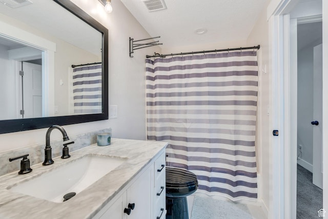 6228 W Copperhawk Dr S, South Jordan, UT 84009 - full bath with vanity, toilet, a textured ceiling, and a shower with curtain