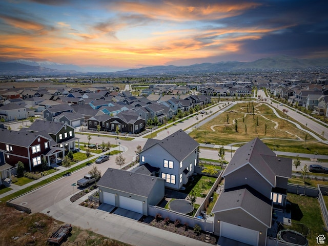 6228 W Copperhawk Dr S, South Jordan, UT 84009 - aerial view at dusk of a residential view and a mountain view