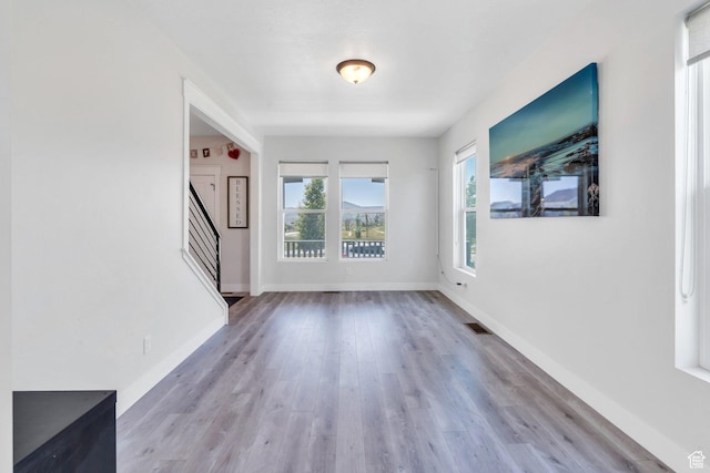 6228 W Copperhawk Dr S, South Jordan, UT 84009 - entryway with stairs, wood finished floors, and baseboards