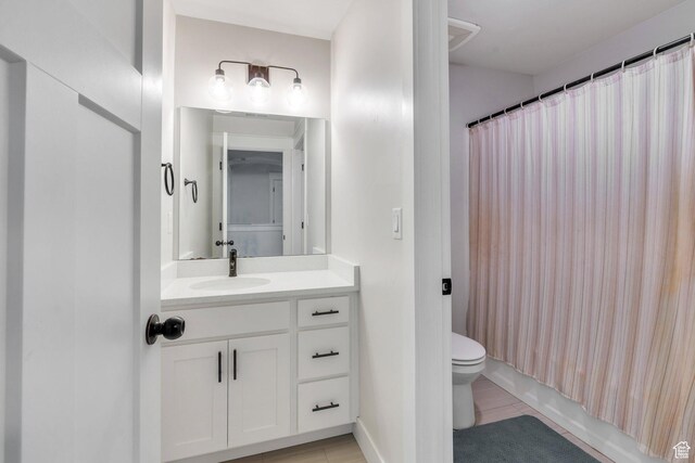 6228 W Copperhawk Dr S, South Jordan, UT 84009 - bathroom featuring toilet, vanity, tile patterned floors, and shower / tub combo with curtain