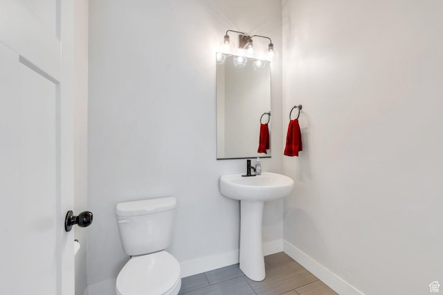 6228 W Copperhawk Dr S, South Jordan, UT 84009 - bathroom featuring toilet and baseboards