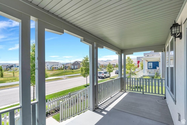 6228 W Copperhawk Dr S, South Jordan, UT 84009 - porch featuring a residential view