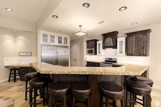 822 E Birken St, Washington, UT 84780 - kitchen featuring built in appliances, dark brown cabinetry, custom exhaust hood, baseboards, and recessed lighting