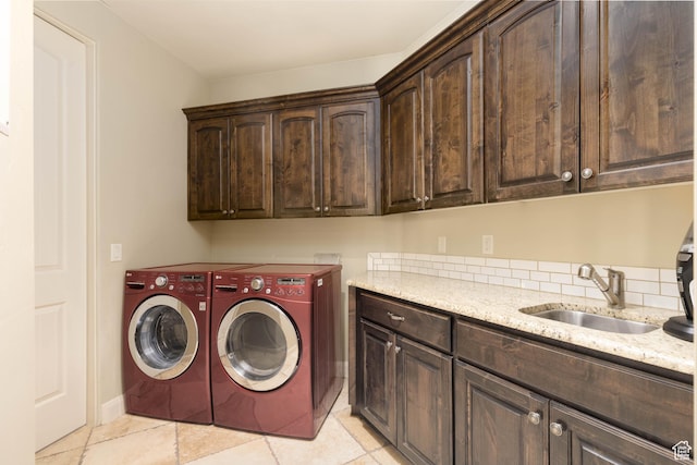 822 E Birken St, Washington, UT 84780 - washroom with cabinet space, washing machine and dryer, and light tile patterned floors