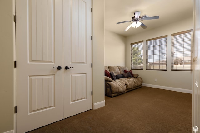 822 E Birken St, Washington, UT 84780 - living area with carpet floors, a ceiling fan, and baseboards
