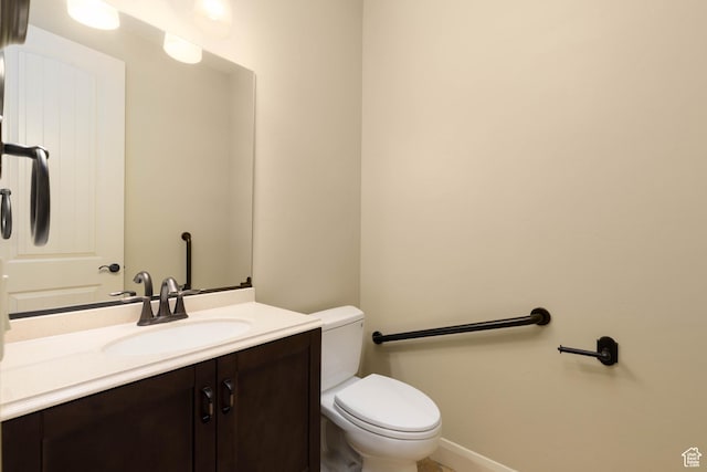 822 E Birken St, Washington, UT 84780 - bathroom with toilet, vanity, and baseboards