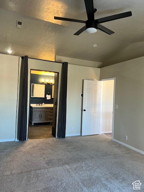 438 E Parowan Way, Draper, UT 84020 - unfurnished bedroom featuring carpet flooring, baseboards, ensuite bath, ceiling fan, and a textured ceiling