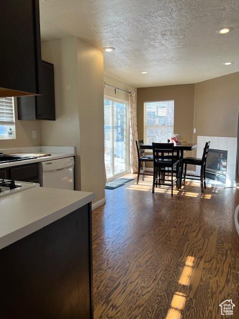 438 E Parowan Way, Draper, UT 84020 - kitchen featuring dishwasher, wood finished floors, a textured ceiling, light countertops, and recessed lighting