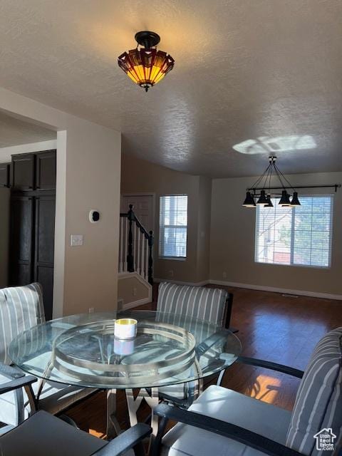 438 E Parowan Way, Draper, UT 84020 - dining space featuring stairway, a textured ceiling, baseboards, wood finished floors, and a chandelier