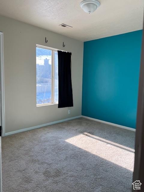438 E Parowan Way, Draper, UT 84020 - carpeted empty room featuring baseboards and a textured ceiling
