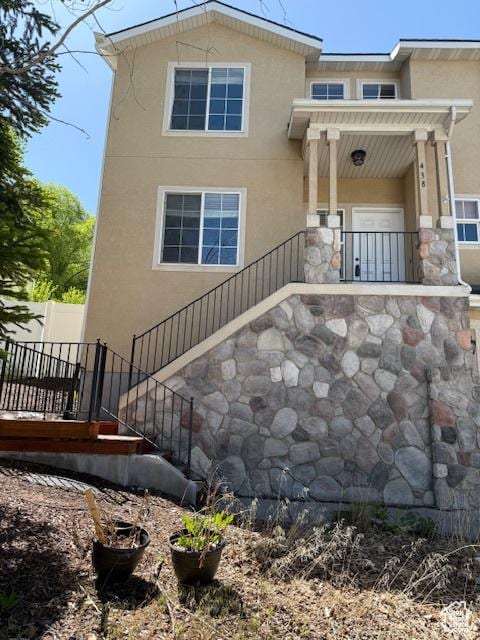 438 E Parowan Way, Draper, UT 84020 - view of front of house with stairway, stucco siding, and covered porch