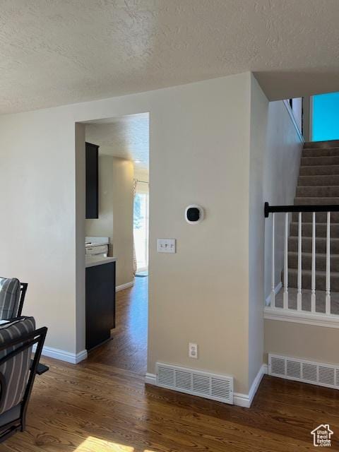 438 E Parowan Way, Draper, UT 84020 - hallway with wood finished floors, baseboards, a textured ceiling, and stairway