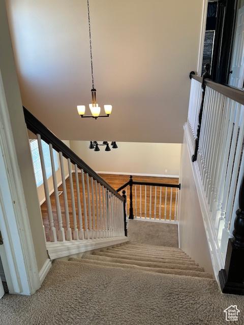 438 E Parowan Way, Draper, UT 84020 - stairs featuring carpet floors and a chandelier
